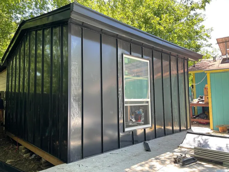 Black standing seam metal wall panels for Roof Inspection in Lynchburg, Moore County