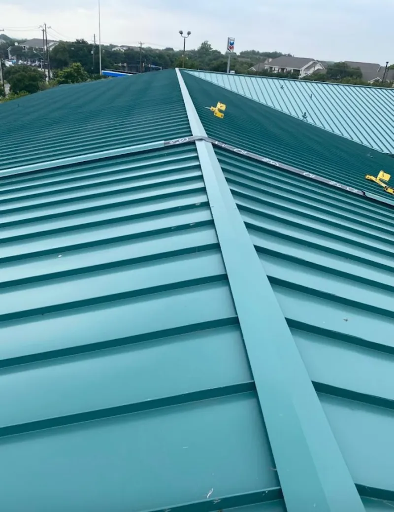 Green commercial metal roof ridge and valley for Metal Roof Repair in Lynchburg, Moore County