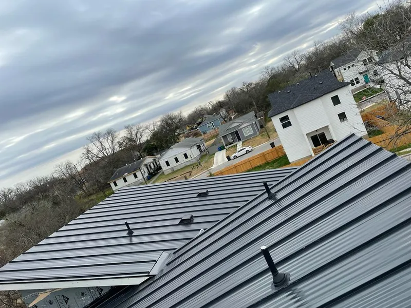 Standing seam metal roof panels with vents for Skylight Repair in Lynchburg, Moore County